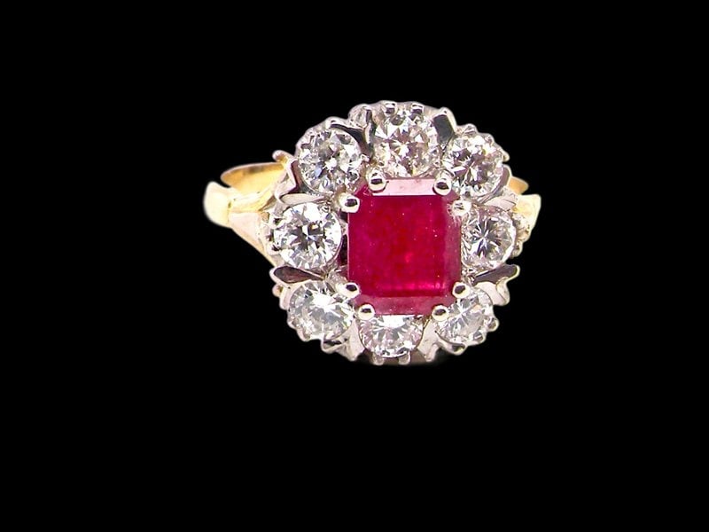 Vintage Tom A fine ruby and diamond cluster ring