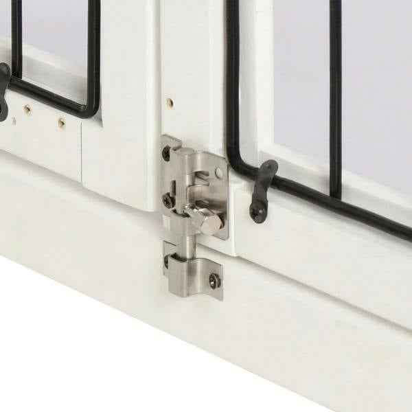 White dog crate end table latch with safety lock on door frame