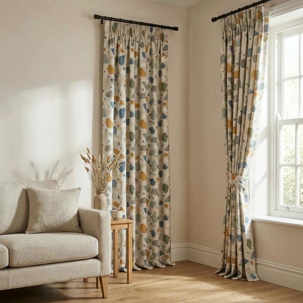 Faro made-to-measure curtains in Terazzo, styled in a living room