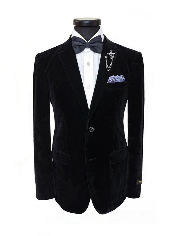 Black velvet blazer jacket by PAMONI displayed on a hanger, showcasing its tailored fit and smooth fabric texture.