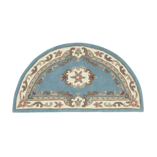 Decorative half-circle rug with floral patterns on a white background