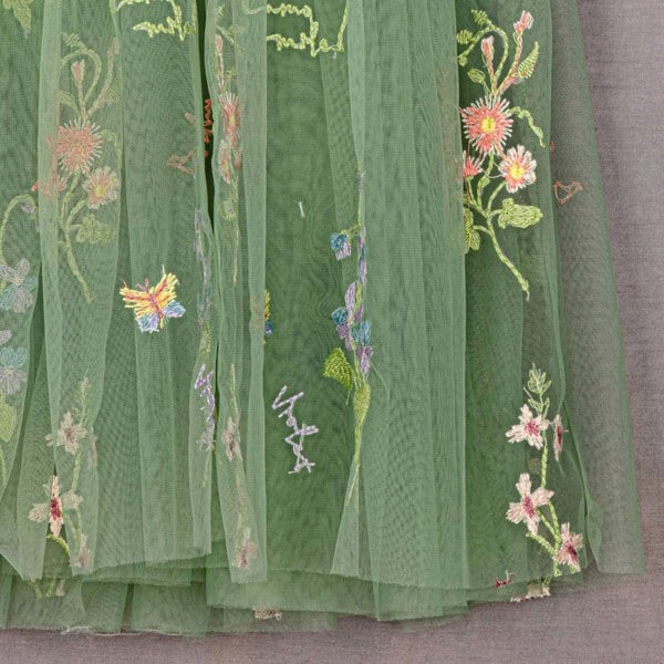 Close up of embroidery on the tulle