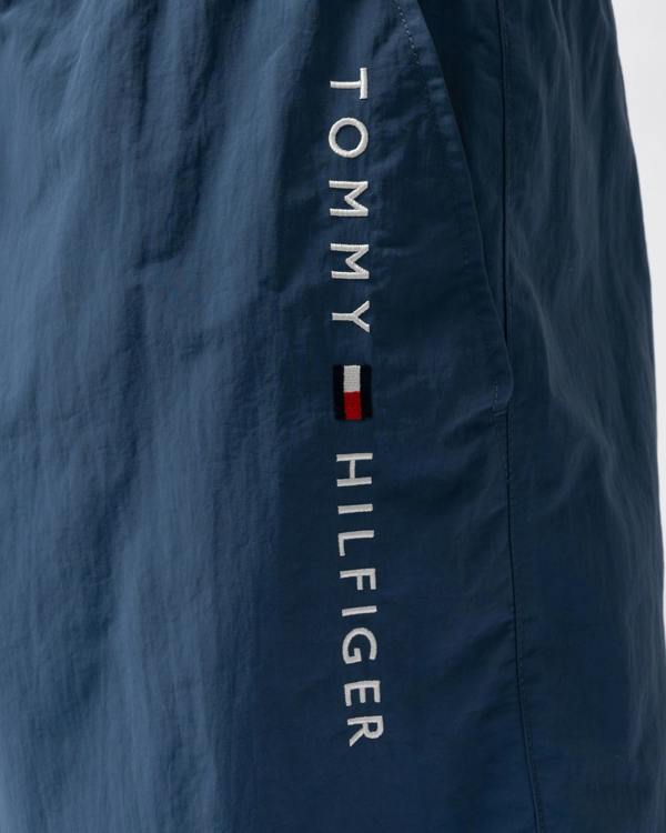 logo detail of Tommy Hilfiger Logo Zip Pocket Mens Drawstring Swimming Shorts in Aegean Sea