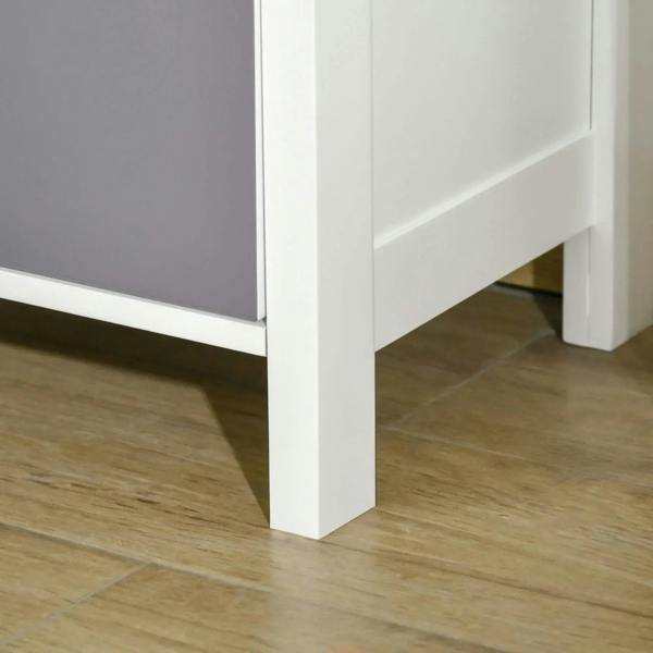 Slim cabinet base with white legs and open space beneath the drawer