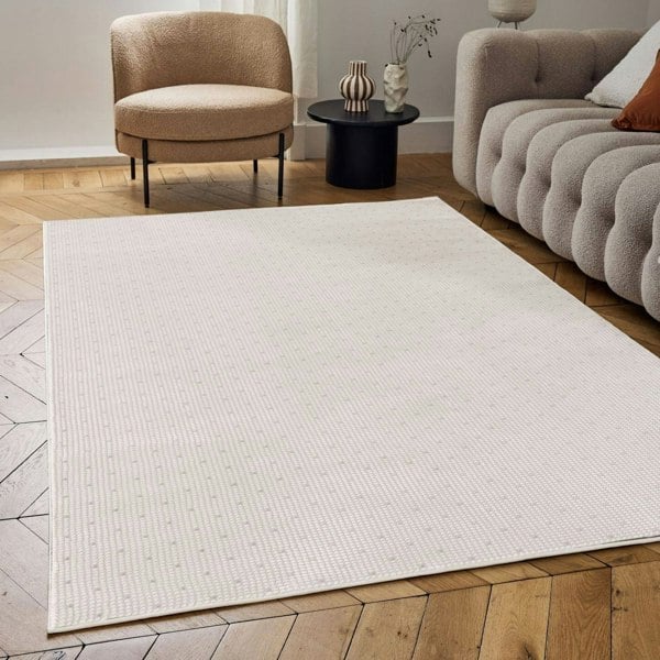 Living Room rug, grey-cream colours, dots, practicality in mind, the rug is anti-allergic.