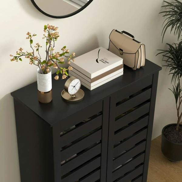 Black narrow shoe cabinet with slatted doors and tabletop for entryway accessories