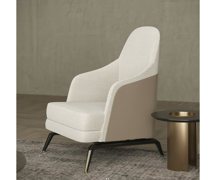 High-back Summers armchair offering comfort and elegance in a refined living space.