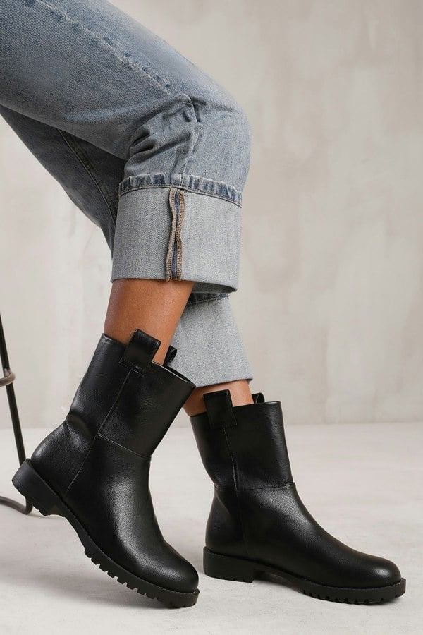 Where's That From Delta Mid Calf Boot With Stitching Detail in Black Grain Faux Leather