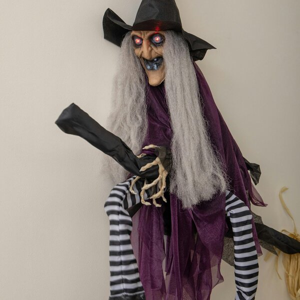 Samuel Alexander 90cm Animated Hanging Halloween Witch with Red Light Up Eyes & Sound