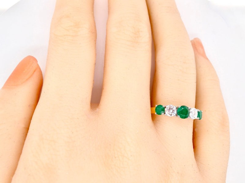 Vintage Tom A five stone half hoop emerald and diamond ring