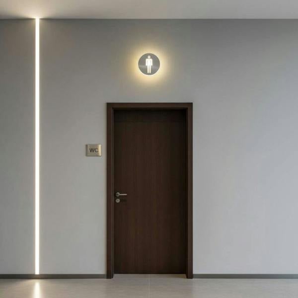 LED male WC sign mounted above the entrance to a toilet 