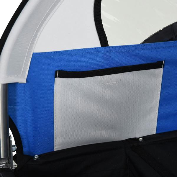 Blue and white bike trailer storage pocket on side panel with black base