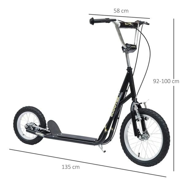 Black and silver kick scooter with kickstand and large front wheel