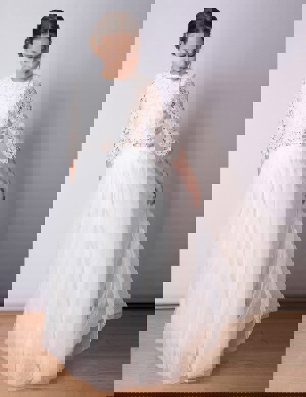 White Lace top and skirt worn by model