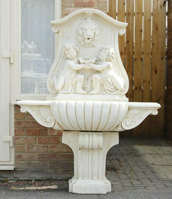 Large White Stone Wall Water Fountain