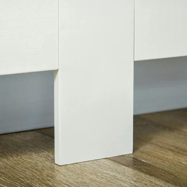 White radiator cover cabinet side panel with straight base on wood floor.