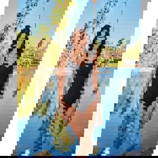 Black Miraclesuit Sanibel Swimsuit with sweetheart neckline and moderate leg