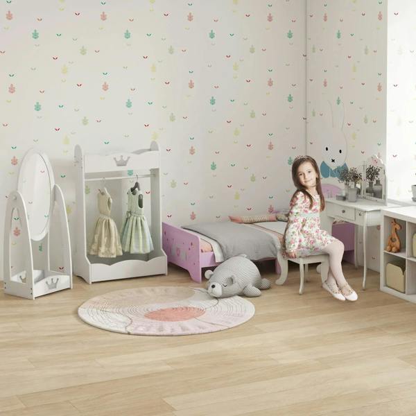 Kids vanity table set with tri-fold mirror, stool, and chair in a playroom