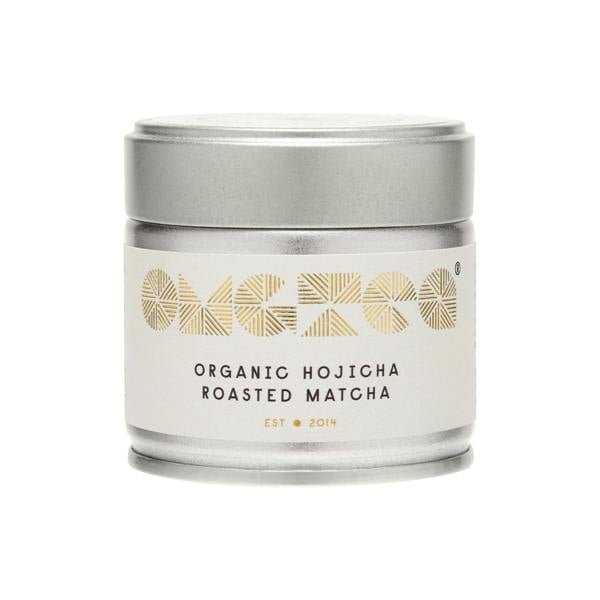 Hojicha roasted matcha with a silver lid on a black background by OMGTea