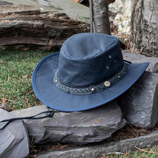 The wilderness navy waxed cotton unisex hat by Wombat