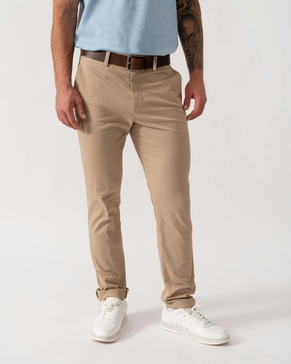 Model wearing Lacoste Slim Fit Stretch Cotton Mens Chinos in Viennese 02S - Main