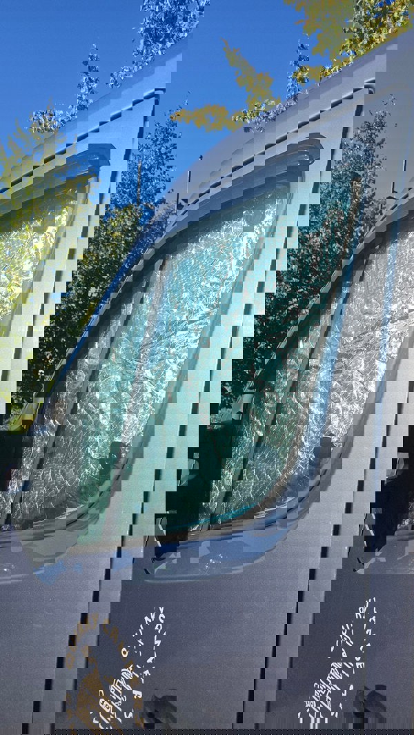 Internal Thermal Blind Set (Renault Master, Vauxhall Movano, Nissan Interstar/NV400) Pictured on the side door window taken from outside the van