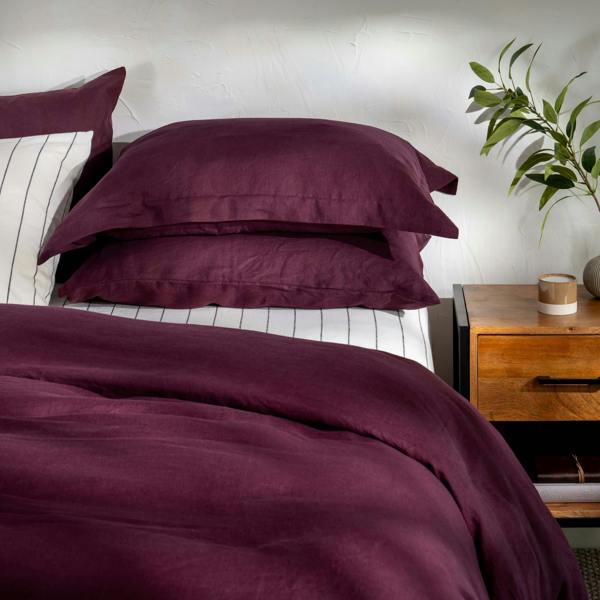 Aubergine French Linen Duvet Cover styled in a bedroom | Soak and Sleep