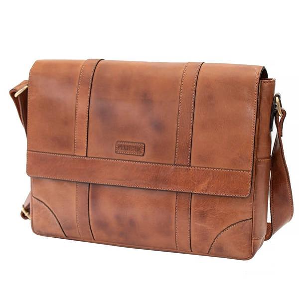 Side profile of Brown leather messenger bag showing 9cm depth and padded construction