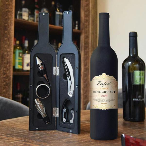 Five piece stainless steel wine accessory gift set showing the tools inside an open matte black wine bottle shaped display box.