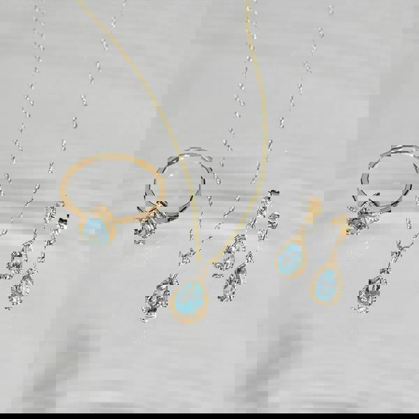 classic-pear-aquamarine-diamond-drop-earrings-in-9ct-yellow-gold-135e1912089 Flatlay