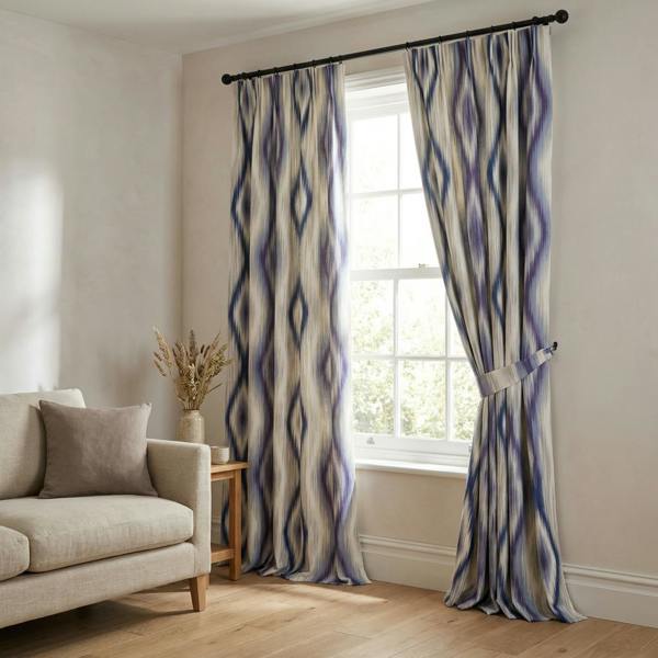 Nepal made-to-measure curtains in Blue, styled in a living room