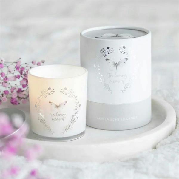 White vanilla-scented candle jar pair with butterfly and memorial text