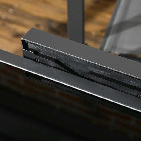 Close-up of the extending tabletop slide track on a dark table frame