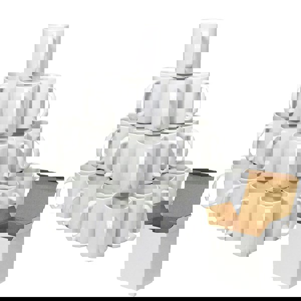 Stack of 36 white polymer-coated AAA mugs arranged in a pyramid with one open white box next to them.