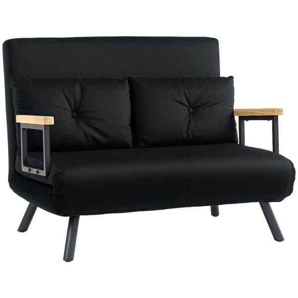 Black velvet-feel sofa bed with tufted pillows, dark legs