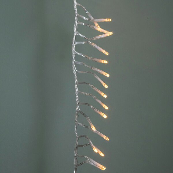 Samuel Alexander 9.3m 720 LED Christmas Cluster String Lights with Timer in Vintage Gold on Clear Cable