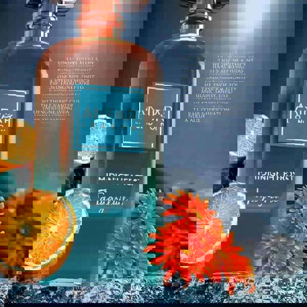 Anfar London Midnight Frost Tangerine Extrait 100ML bottle with orange slice and flowers