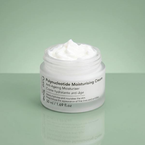 Open jar of Pure Tone Aesthetics Polynucleotide Moisturising Cream showing the rich cream texture