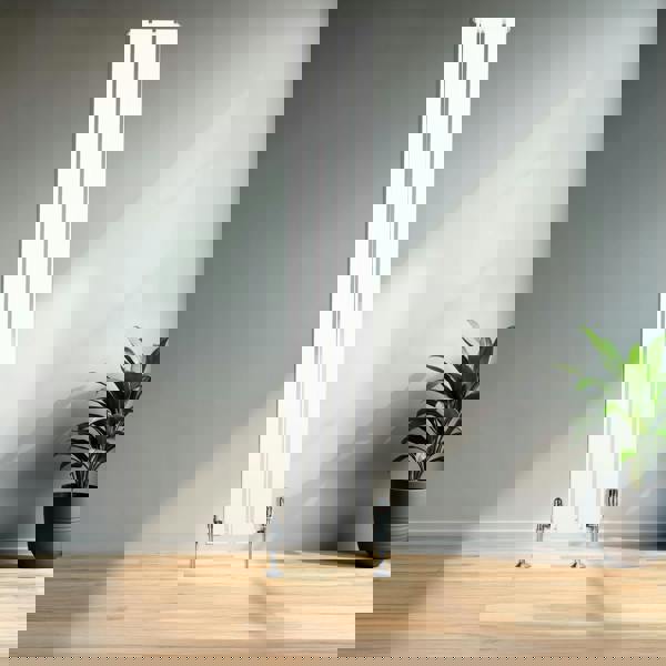 Flat single column radiator in sleek white finish, 1800 x 280mm, featuring vertical panels and chrome feet, set against a modern interior