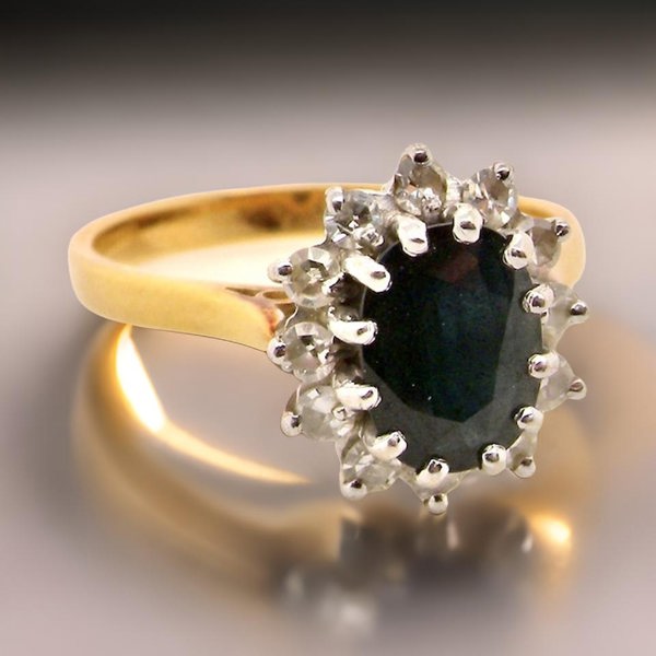 Vintage Tom A traditional Sapphire and Diamond cluster ring