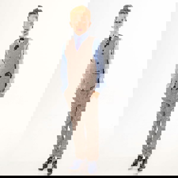 Boy wearing tweed trousers and waistcoat