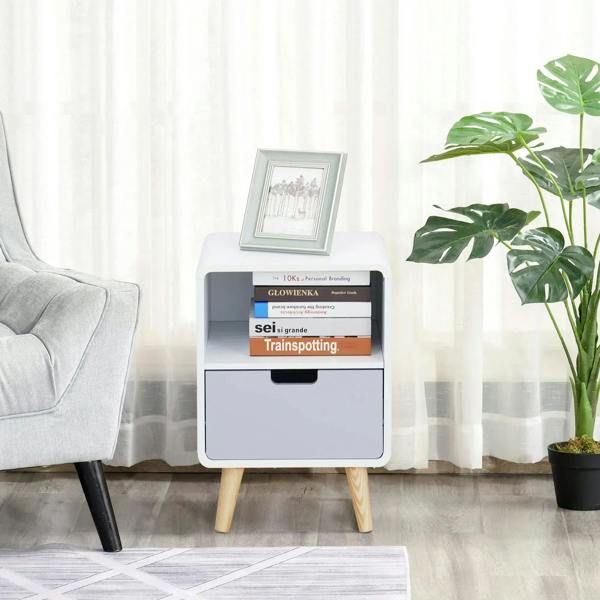 White nightstand with open shelf and drawer, light wood legs