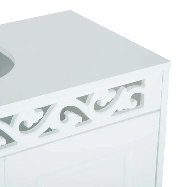 White cabinet top trim with scalloped cutout and decorative edging