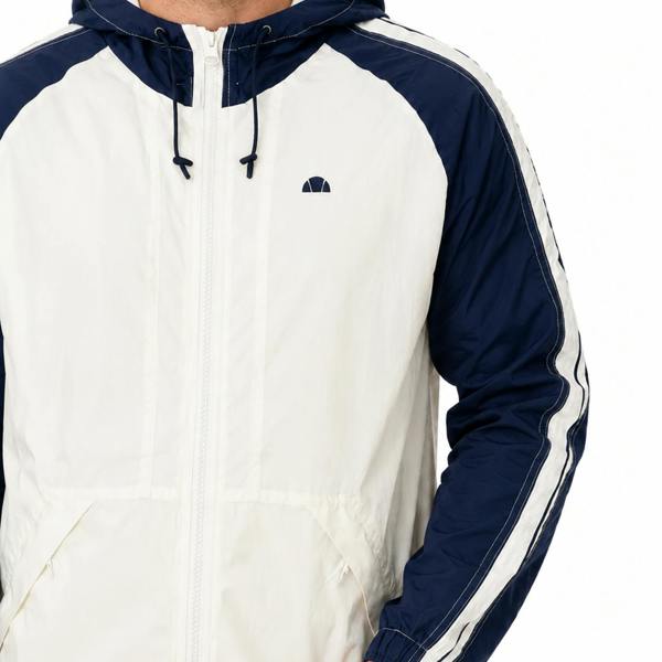 Ellesse Casillo ecru and navy woven shell jacket with a drawstring hood, full zip front, and side stripe detailing.