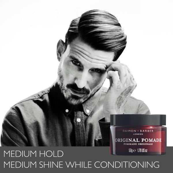 Male model in black and white with slicked back hair with Original Pomade Jar