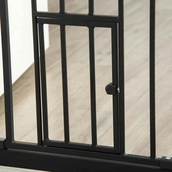 Close-up of black pet gate bottom frame and vertical bar panel