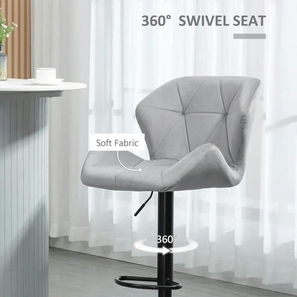 Grey 360° swivel bar stool with tufted back, curved seat, and black ring footrest