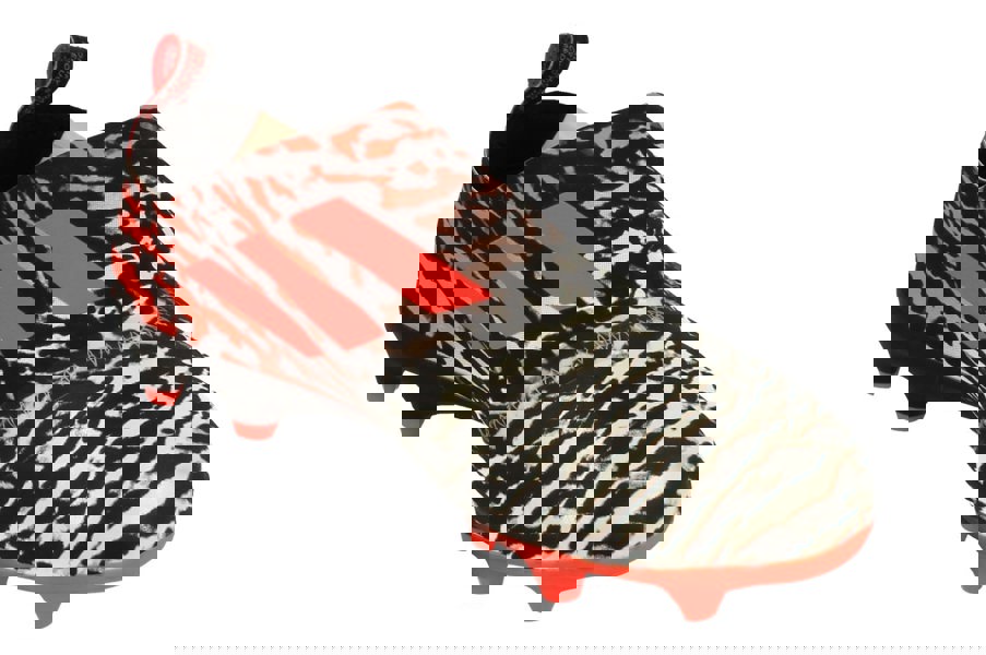 Adidas Glitch Outerskin in an orange and white leapord design. This angle showcases the snug fit of the outerskin.