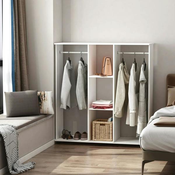 White open wardrobe organizer with hanging rod, shelves, and cubbies for clothing