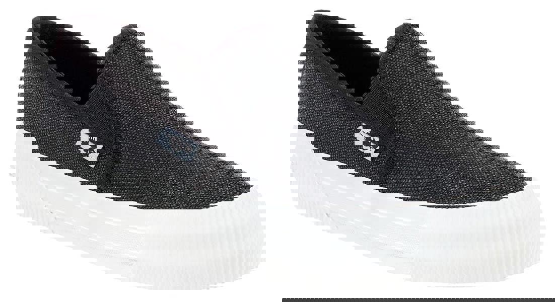 Rocket Dog Cheeryful Womens Slip On Casual Trainers Shoe, black fabric slip-on sneaker with white rubber sole and logo tag on side.